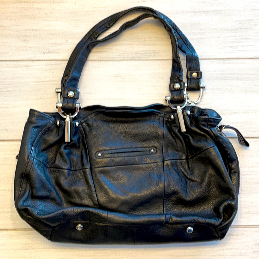 Black leather B. Makowsky purse with leopard print inside